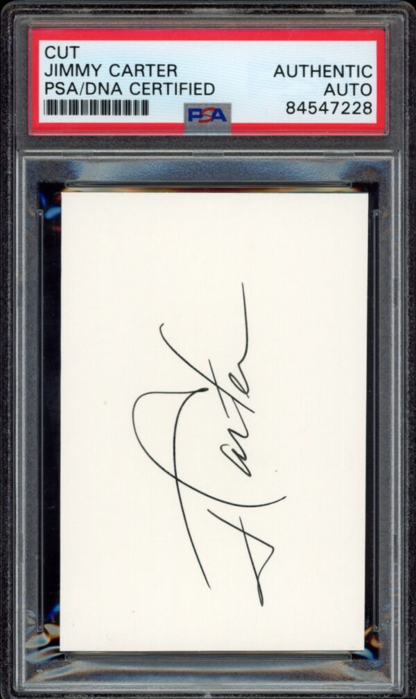 Authenticated Jimmy Carter autograph in protective display slab for collectors.