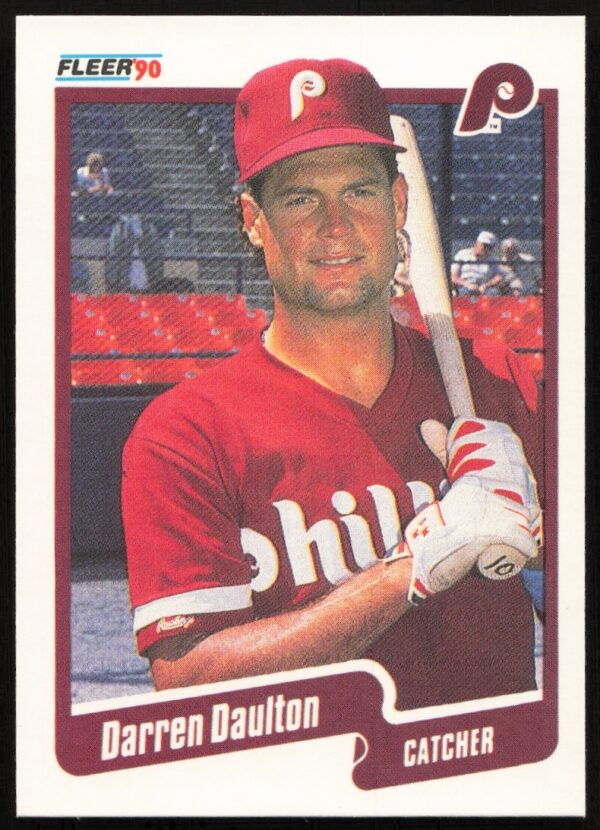 1990 Fleer Baseball Card #555 of Phillies catcher Darren Daulton in uniform.