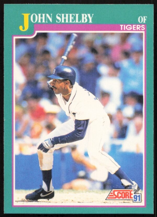 1991 Score Baseball Card #609 of John Shelby in uniform, featuring team logo.