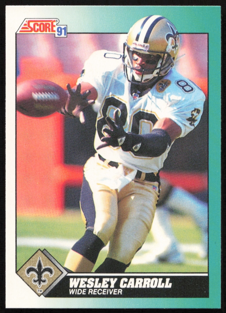 1991 Score Football Card, Wesley Carroll #65T, showcasing determined athletic action in team uniform.