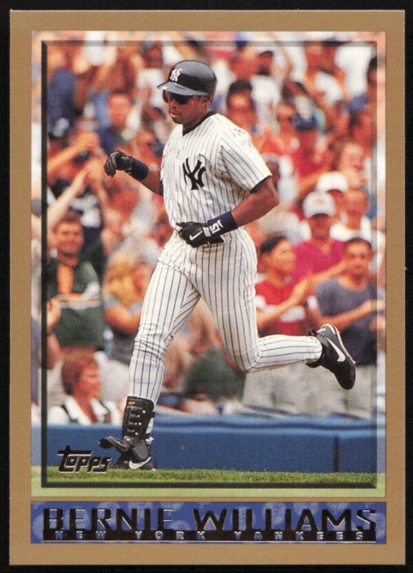 Bernie Williams 1998 Topps #293, Yankees uniform, mid-swing, collectible card.