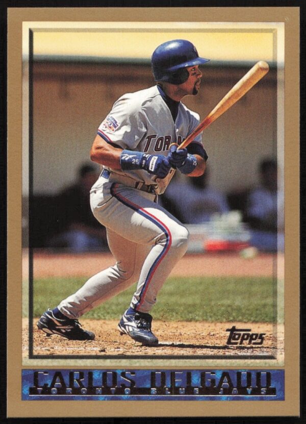 Carlos Delgado 1998 Topps card #384, Toronto Blue Jays, baseball action pose.