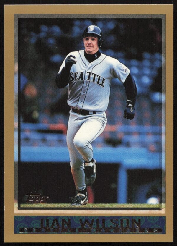 Vintage 1998 Topps Dan Wilson baseball card #38 featuring Mariners catcher in action.