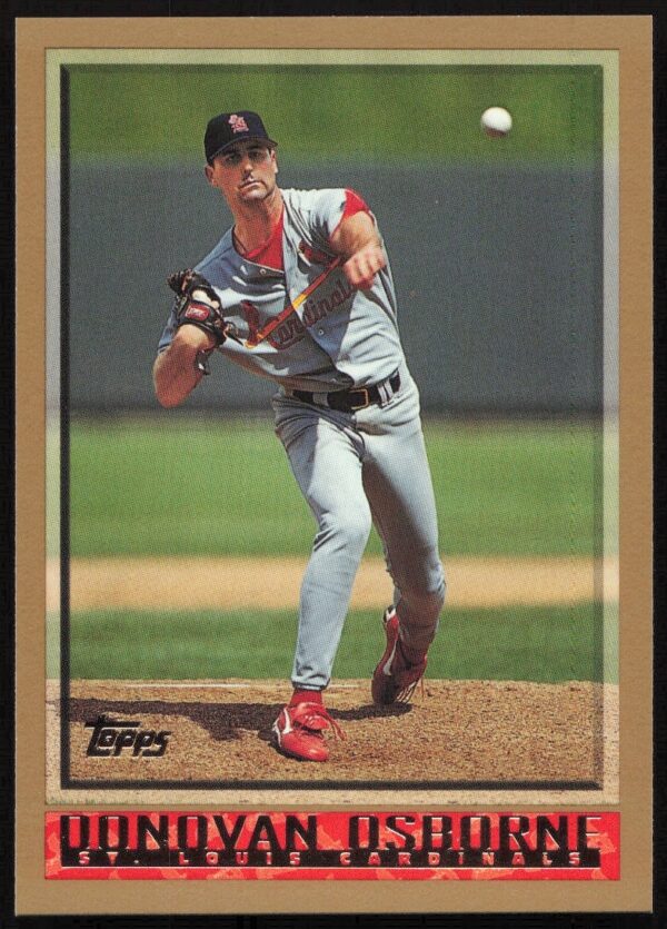1998 Topps Donovan Osborne card showcasing pitching action in Cardinals uniform.
