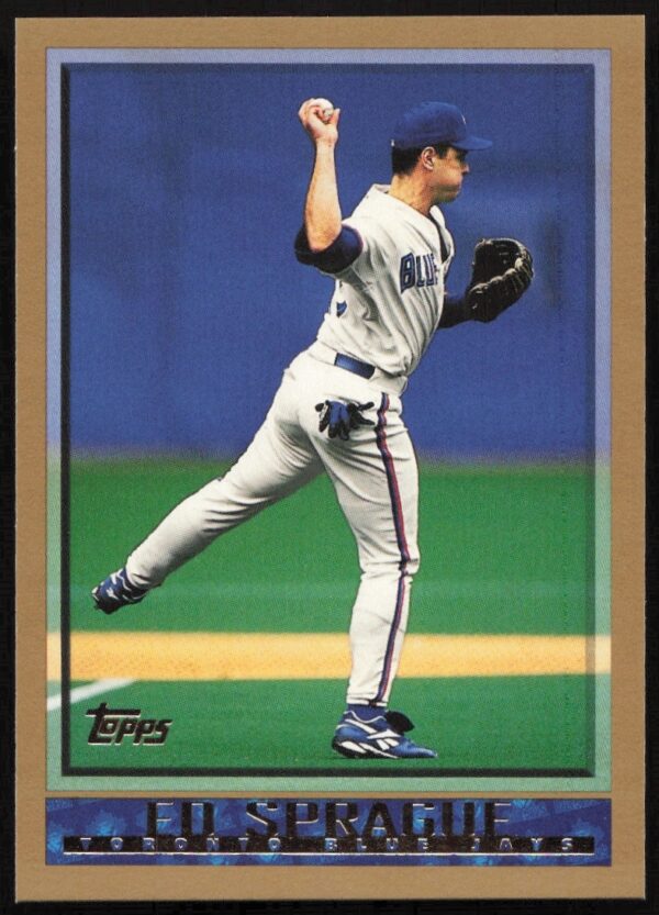 Ed Sprague 1998 Topps #428, Toronto Blue Jays, action shot, vibrant stadium backdrop.