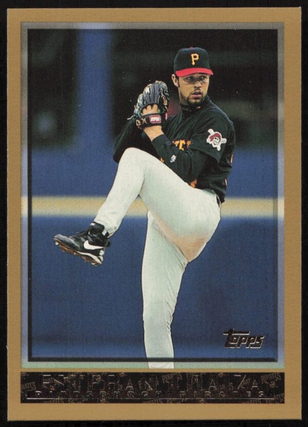 Esteban Loaiza 1998 Topps card, pitching pose, vibrant colors, team logo visible.