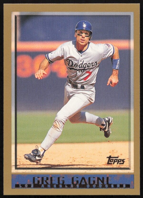 Greg Gagne in action, 1998 Topps Baseball Card #73.