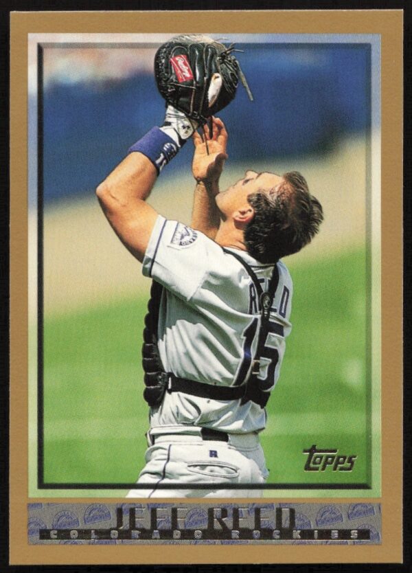 1998 Topps Jeff Reed baseball card showcasing catcher in action shot #199.