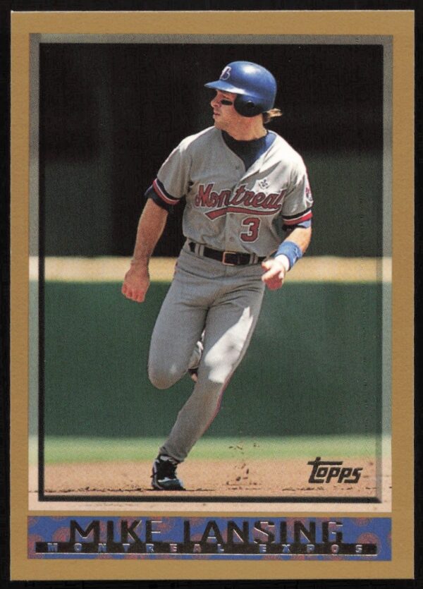 1998 Topps Mike Lansing baseball card #136, featuring action-packed game photo.