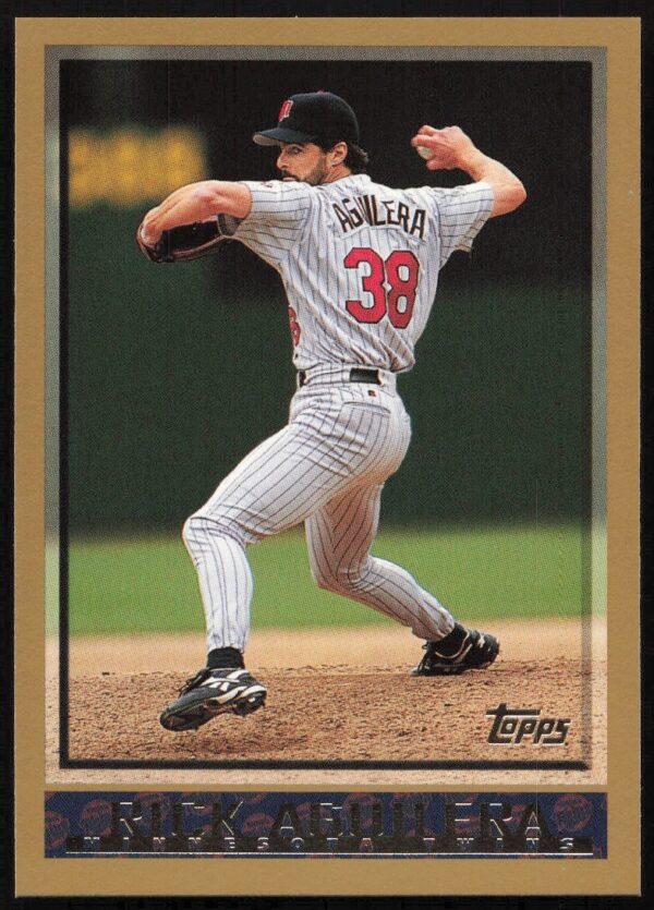 Rick Aguilera 1998 Topps #95: Pitching Action, Name at Base, Topps Logo Present.