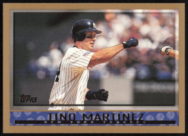Tino Martinez 1998 Topps #284, Yankees uniform, bat on shoulder, stadium background.