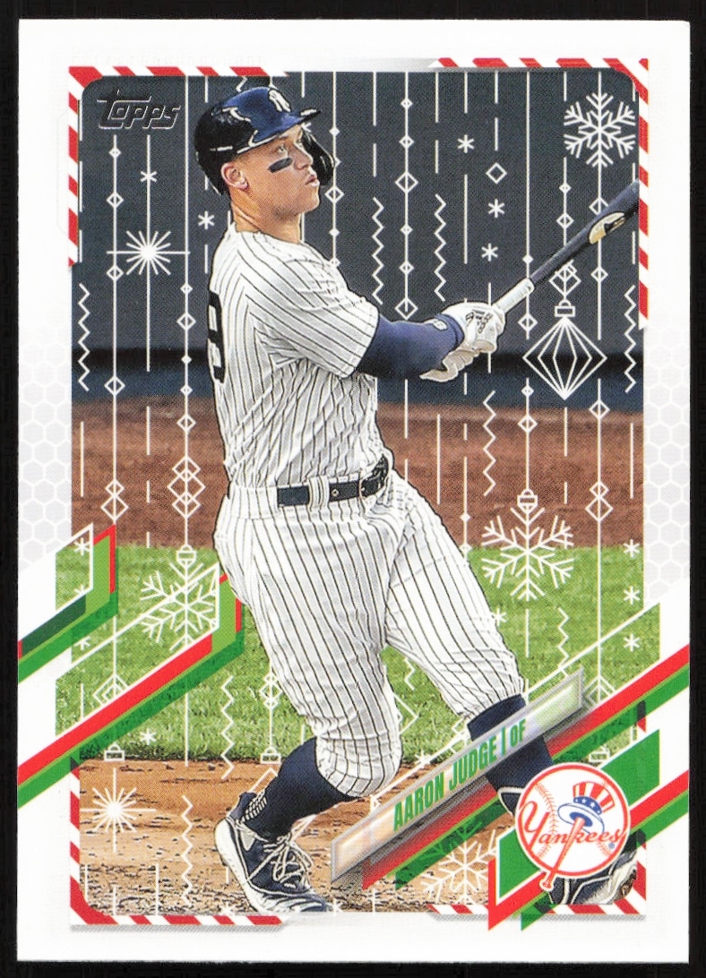 Front of 2021 Topps Holiday Aaron Judge card #HW99, with festive design and batting pose.