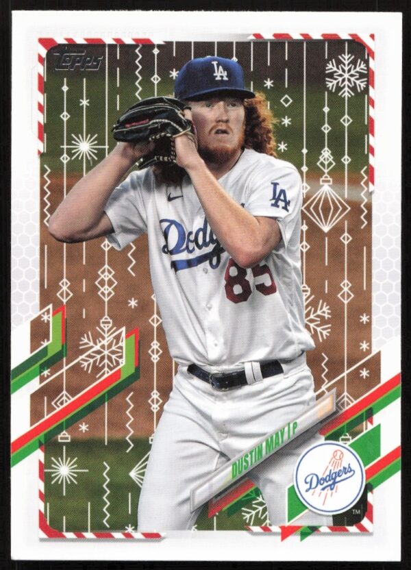 2021 Topps Holiday card featuring Dodgers pitcher Dustin May with festive, holiday-themed design.