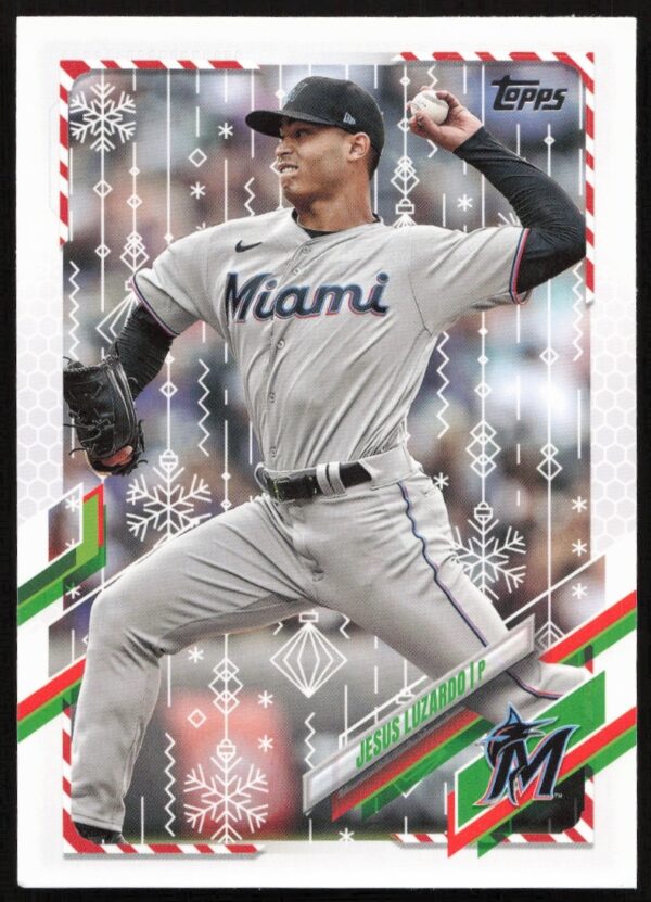 2021 Topps Holiday card featuring Jesus Luzardo in action, with festive winter design.