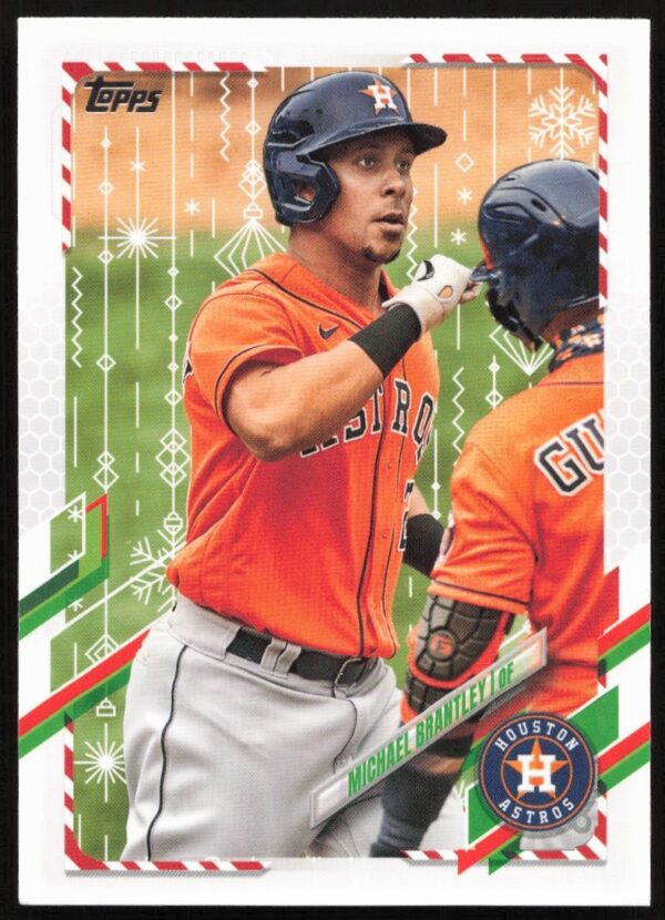 Michael Brantley 2021 Topps Holiday Card #HW69, Houston Astros, festive winter backdrop.