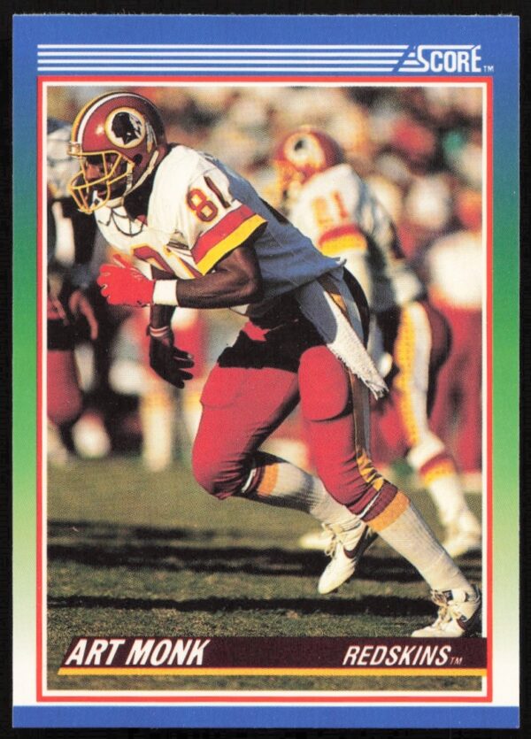 Art Monk 1990 Score #12 football card, showing game action in Washington Redskins uniform.
