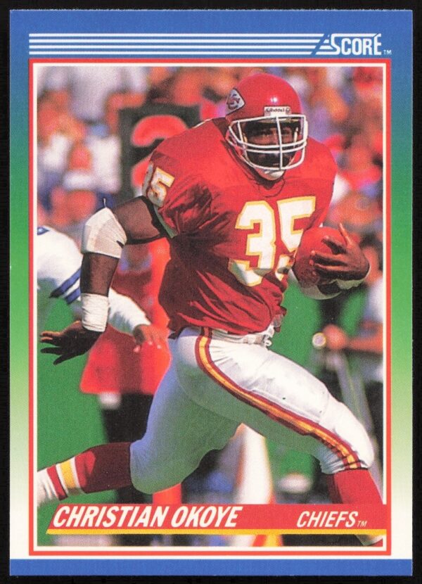 1990 Score Football Card of NFL Star Christian Okoye in Kansas City Chiefs Uniform.