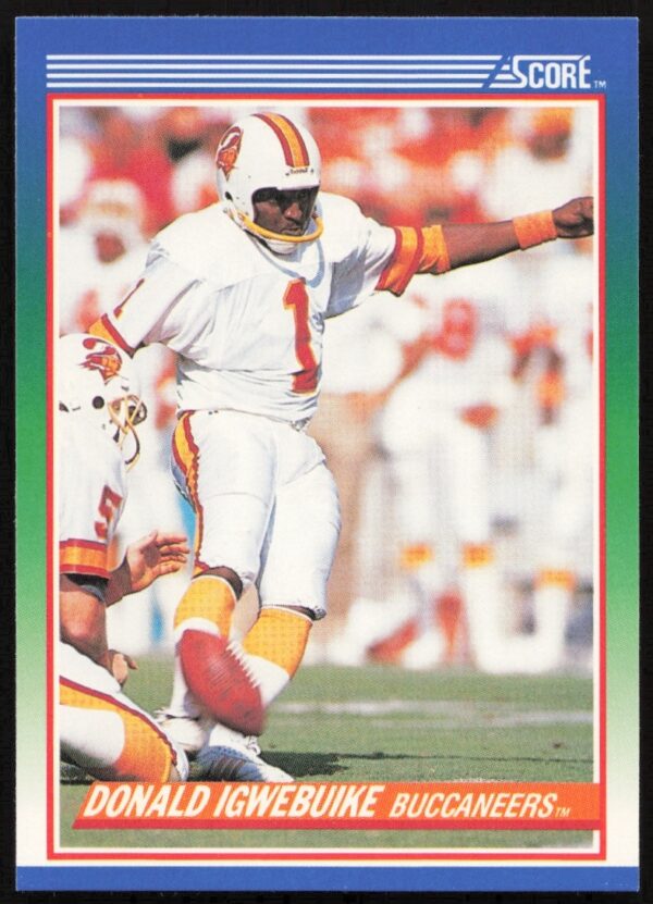 1990 Score football card of Donald Igwebuike, front view, #99 jersey, poised stance.