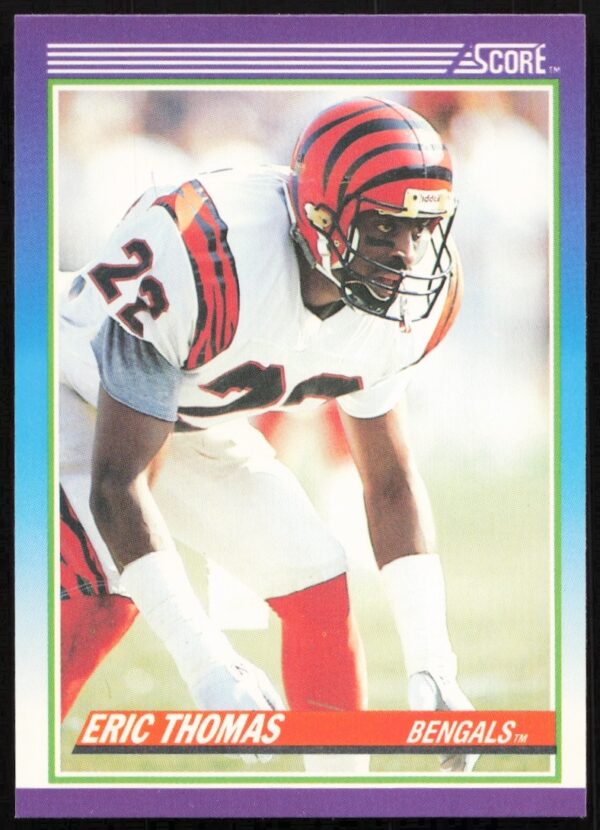 Front of 1990 Score Football Card #141 featuring Eric Thomass portrait and vintage design.
