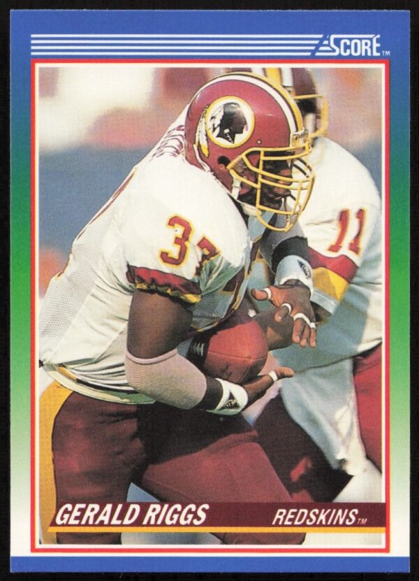 1990 Score card #66: Gerald Riggs in Falcons uniform, mid-action on field.