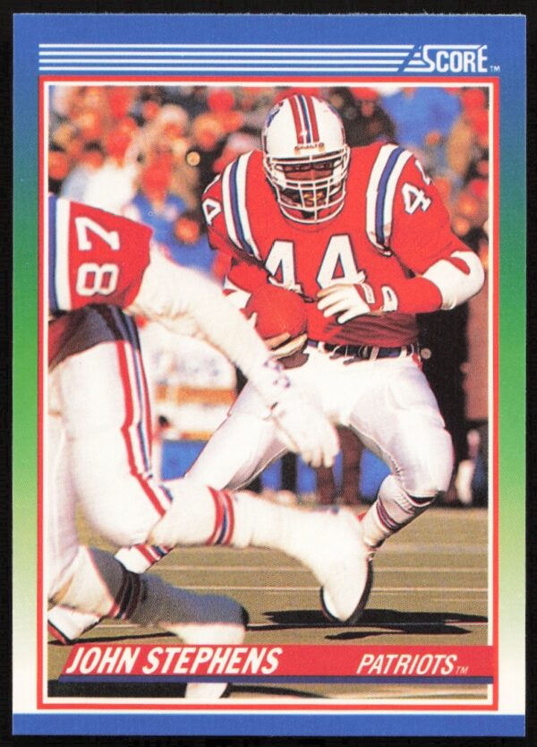 1990 Score Football Card #11 featuring John Stephens in action with the New England Patriots.