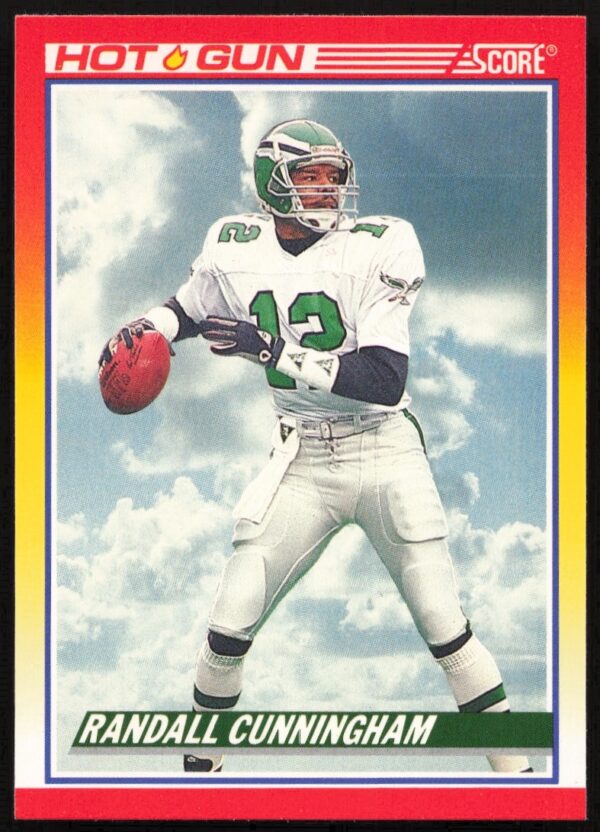 NFLs Randall Cunningham 1990 Score card, mid-action pass, Philadelphia Eagles uniform.