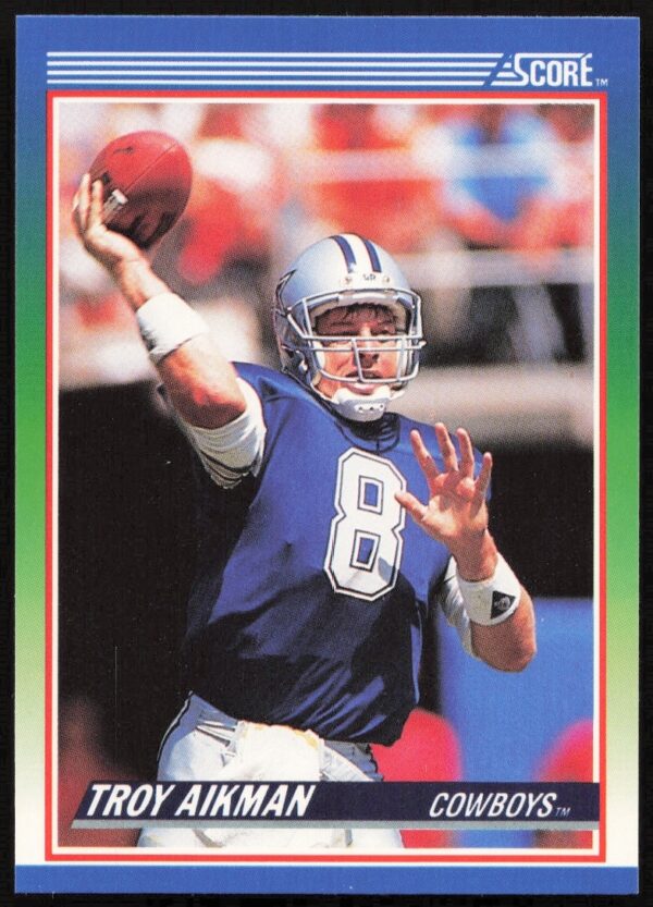 Troy Aikman 1990 Score card #21, Dallas Cowboys quarterback in action, front view.