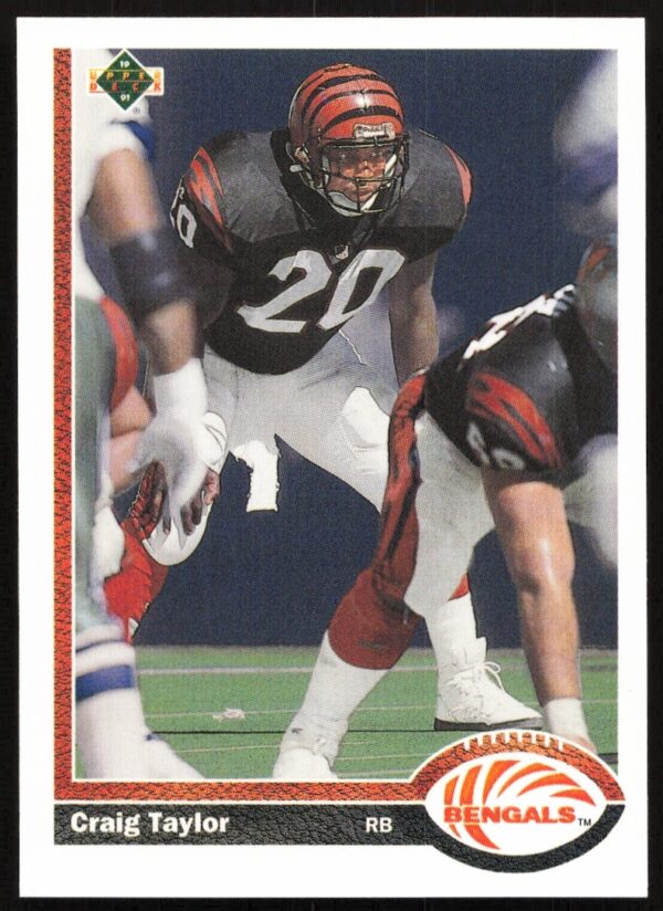 Craig Taylor 1991 Upper Deck Trading Card, #676, Mid-Action Football Pose.