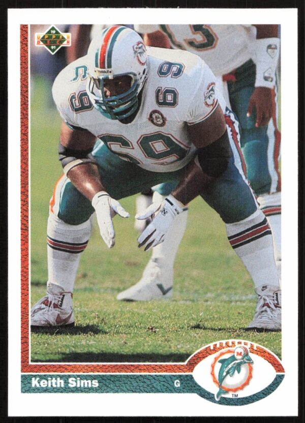 Keith Sims 1991 Upper Deck Football Card #385, Miami Dolphins action shot.