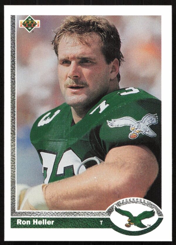 Miami Dolphins Ron Heller in action on 1991 Upper Deck football card #319.