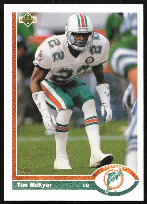 1991 Upper Deck Football Card featuring Tim McKyer, #274, showing him in action on the field.