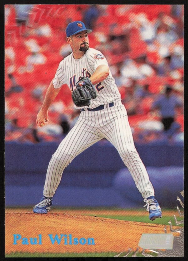 Paul Wilson pitching in 1998 Upper Deck baseball card #296, New York Mets uniform.