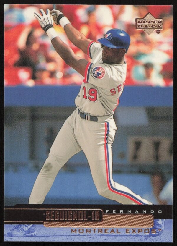 Front of 2000 Upper Deck Fernando Seguignol baseball card, showcasing athlete in action.