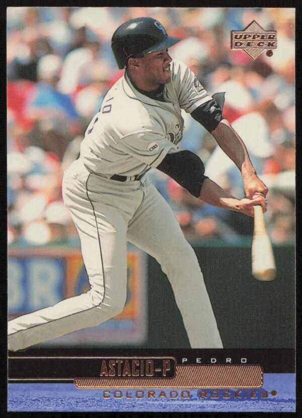 Pedro Astacio Upper Deck 2000 Card #104, front view, pitching stance in Rockies uniform.