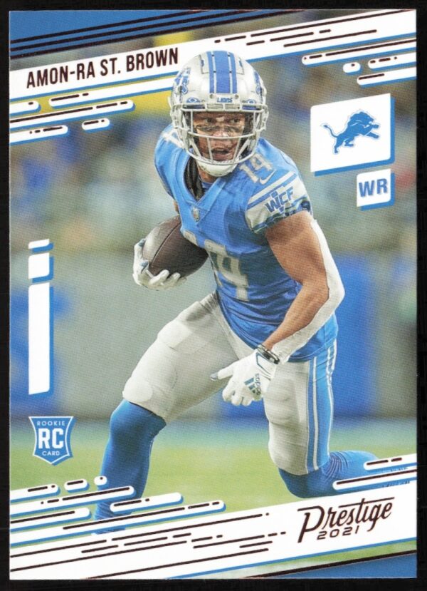 2021 Panini Chronicles Amon-Ra St. Brown Rookie Card Front #234, featuring dynamic rookie action.