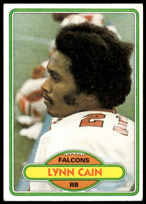 Atlanta Falcons 1980 Topps Lynn Cain vintage card #517, showcasing retro design and players athletic pose.