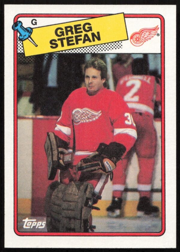 Front of 1988-89 Topps Greg Stefan #68 hockey card in Detroit Red Wings uniform.