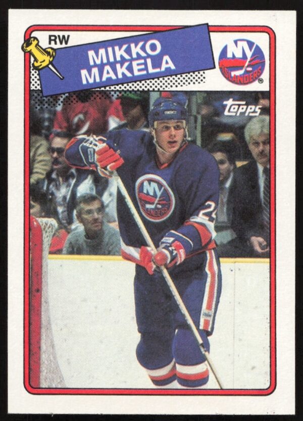 1988-89 Topps Mikko Makela hockey card in Islanders jersey, mid-action on ice.