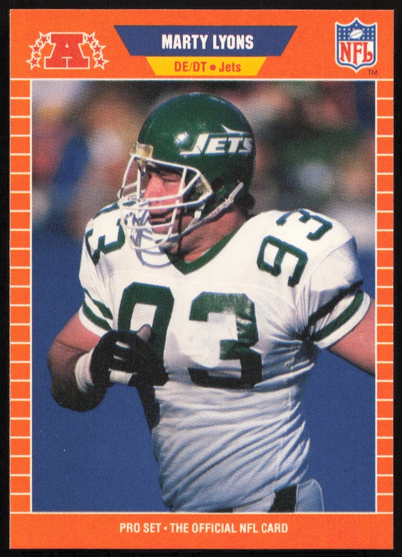 1989 Pro Set Football Card #301: Marty Lyons, New York Jets defensive lineman in action.