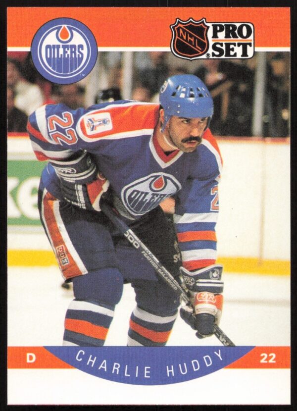 1990-91 Pro Set Hockey Card #85 featuring Charlie Huddy in action.