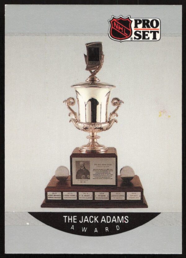 1990-91 NHL Pro Set Jack Adams Award card commemorating top coaching achievement.