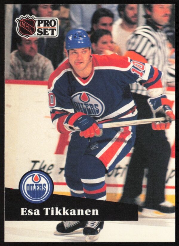 Esa Tikkanen 1991-92 NHL card showcasing dynamic action in Edmonton Oilers uniform.