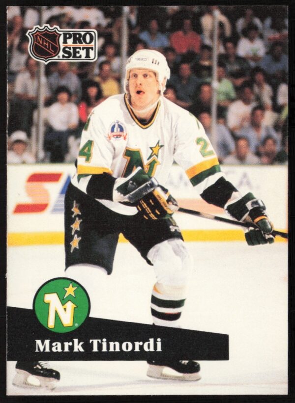 1991-92 NHL Pro Set card featuring Mark Tinordi, Minnesota North Stars, #107, in action.