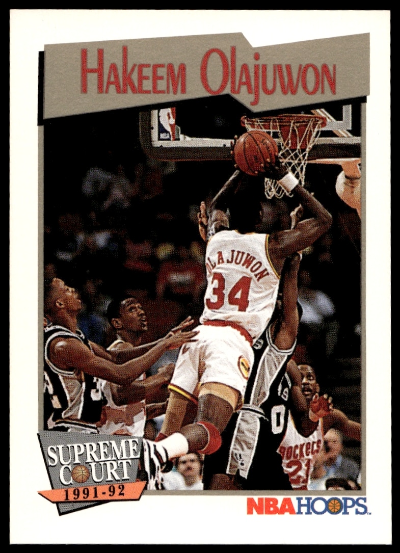 1991 Hoops trading card of Hakeem Olajuwon wearing Houston Rockets uniform, #467.