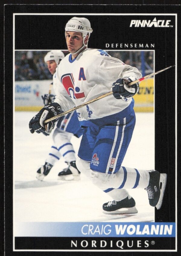 Craig Wolanin 1992 Pinnacle Hockey Card #107, dynamic action, team jersey.