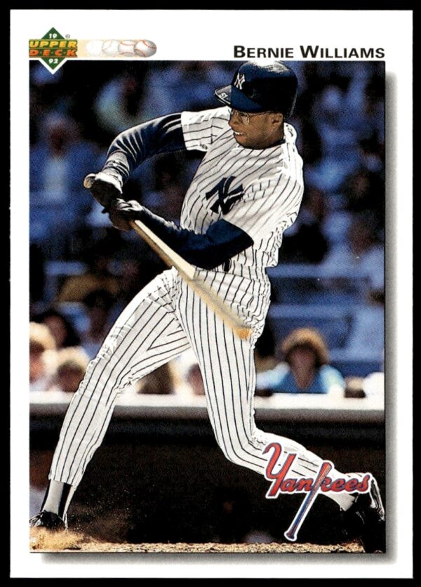 Bernie Williams 1992 Upper Deck baseball card, action shot mid-swing, Yankees uniform #556.