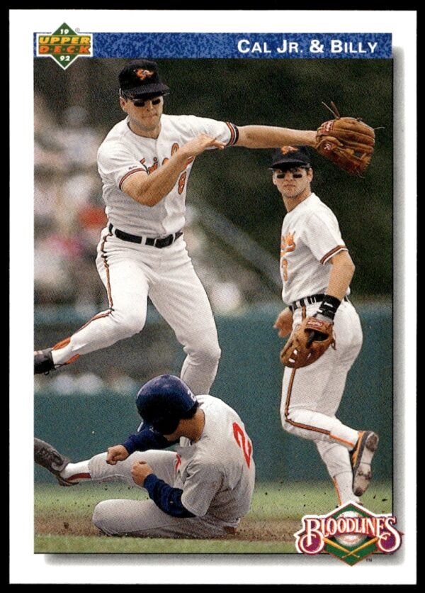 1992 Upper Deck baseball card featuring Cal Ripken Jr. and Billy Ripken in a dynamic pose.
