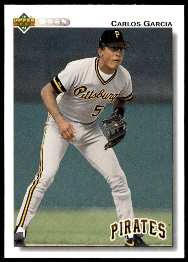 Carlos Garcia, 1992 Upper Deck card, Pittsburgh Pirates infielder showcasing skills in action.