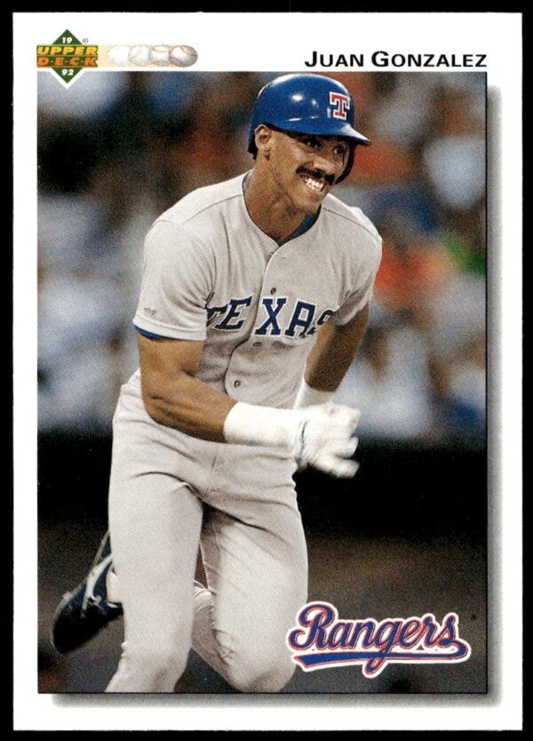 1992 Upper Deck Juan Gonzalez Texas Rangers baseball card #243, showcasing action batting stance.
