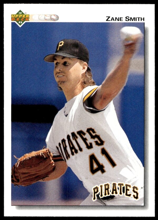 Zane Smith pitching for Braves on 1992 Upper Deck baseball card #486, dynamic action shot.